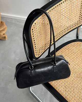 Oval long shoulder bag