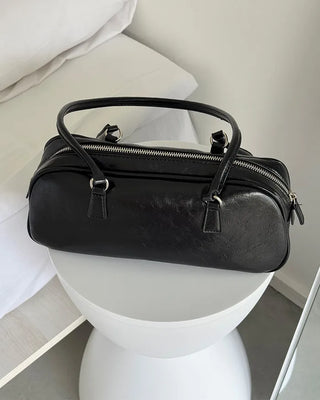 Oval long shoulder bag