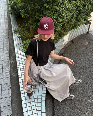 Drawstring net pocket backpack