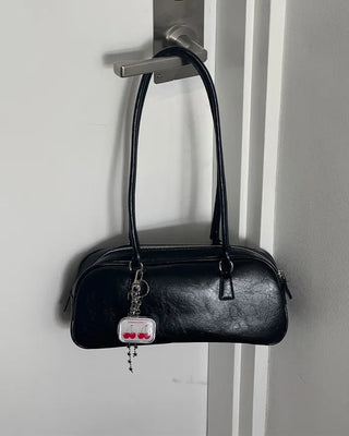 Oval long shoulder bag