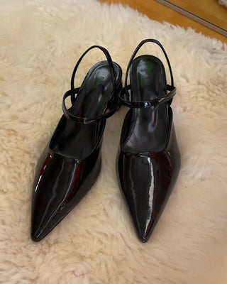 Pointed-toe strap heels