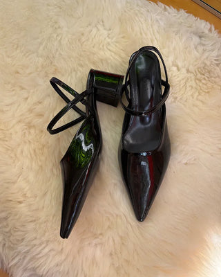 Pointed-toe strap heels