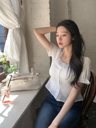 Back ribbon puff blouse