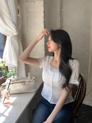 Back ribbon puff blouse