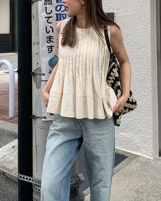 Pleated sleeveless blouse
