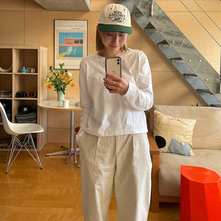 Brushed-back cotton pleated pants