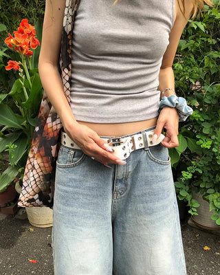 Double eyelet leather belt