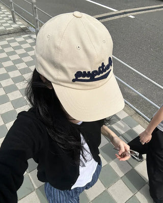 Antique lettering cap