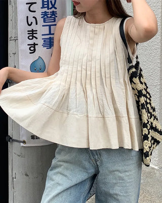 Pleated sleeveless blouse