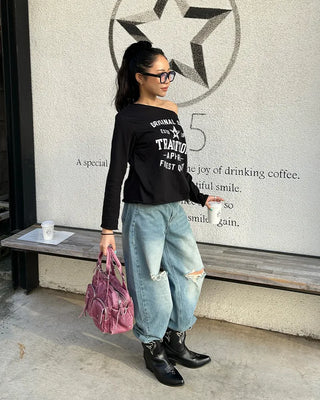 Knee-damaged vintage denim pants