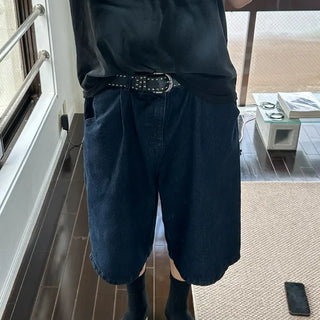 Wide-leg pleated half-length slacks