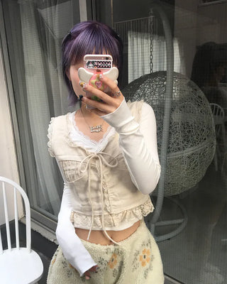 Lace hem cropped sleeveless bustier