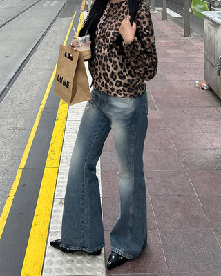 Eyelet pointed-toe mules
