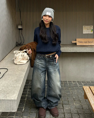 Seam-stitched distressed wide-leg denim pants
