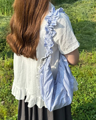 Striped half-moon shirred bag