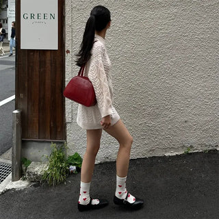 Half-round shoulder bag