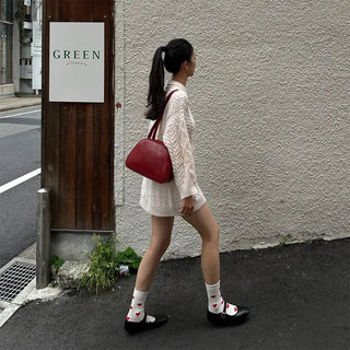 Half-round shoulder bag