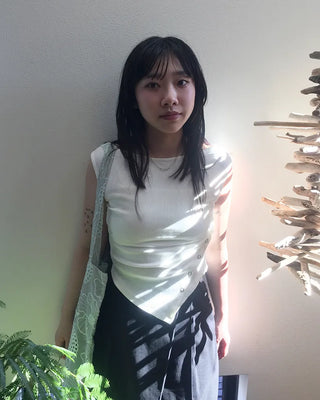 Asymmetrical Snap Button Sleeveless Top