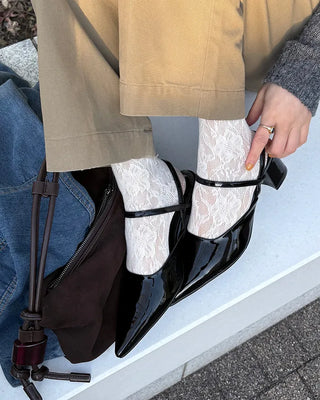 Pointed-toe strap heels
