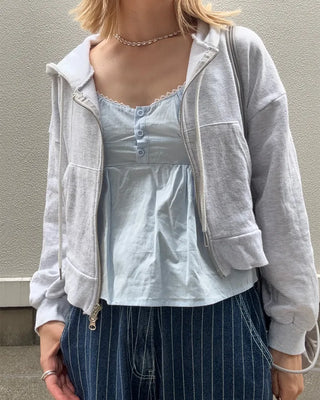 Half-button peplum camisole