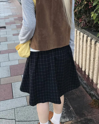Checked pleated midi skirt