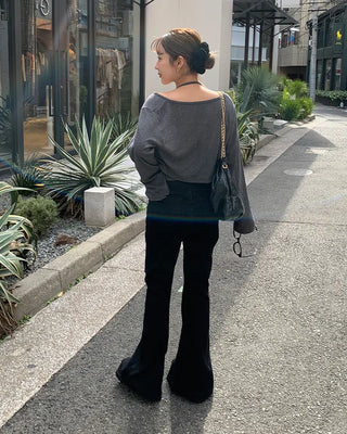 Double-button slit bootcut denim pants
