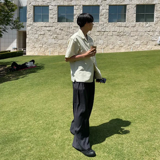 Wide-leg pants with belt and pleats