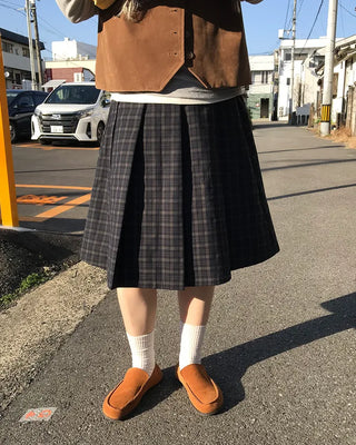 Checked pleated midi skirt