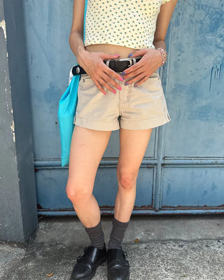 Adjustable tab side pocket shorts