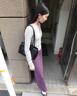 Button-detail long skirt
