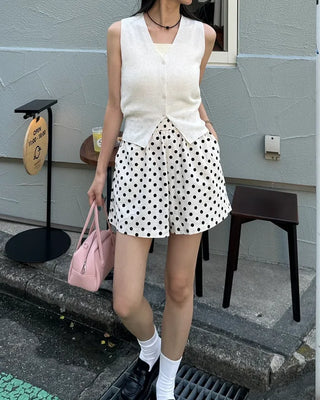 V-neck button-up sleeveless top
