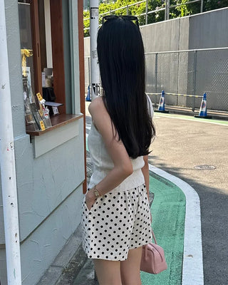 V-neck button-up sleeveless top