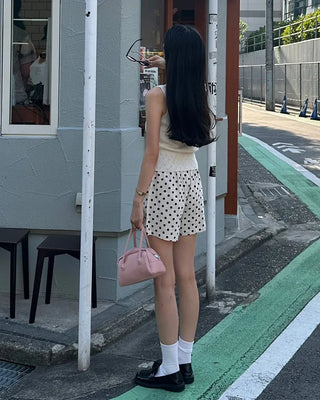 V-neck button-up sleeveless top