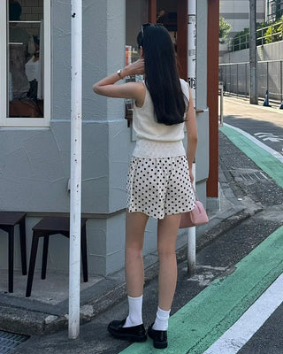 V-neck button-up sleeveless top
