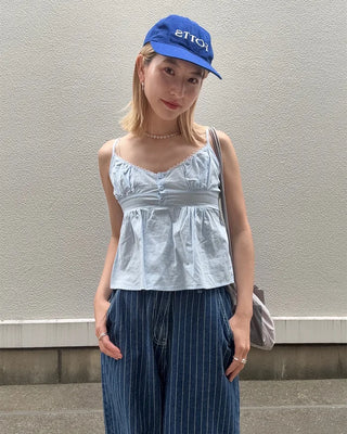 Half-button peplum camisole