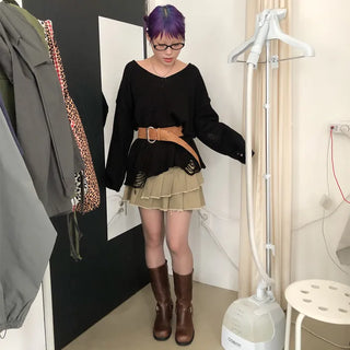 Distressed long knit sweater