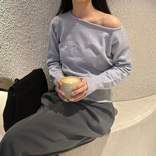Asymmetrical off-shoulder knit