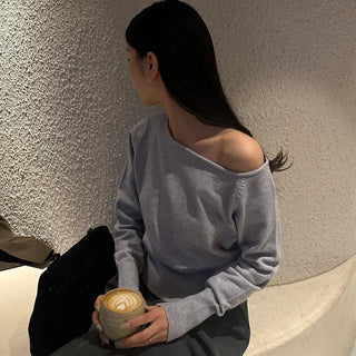 Asymmetrical off-shoulder knit