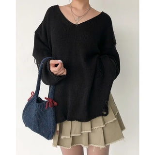 Distressed long knit sweater