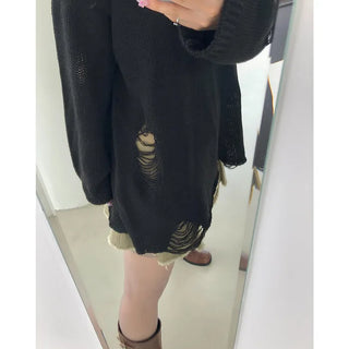 Distressed long knit sweater
