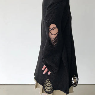Distressed long knit sweater