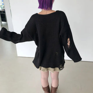 Distressed long knit sweater