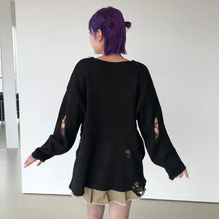 Distressed long knit sweater