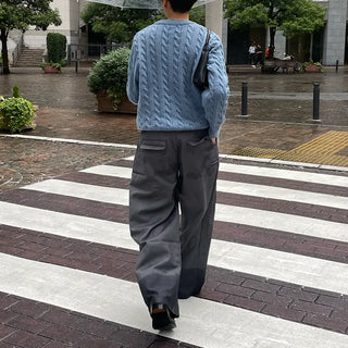 Wide-leg slacks with side pleats