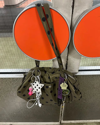 Outer pocket side gathered polka dot Boston bag