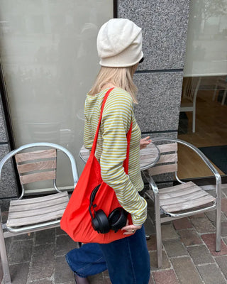 Boat neck striped perforated cut and sew