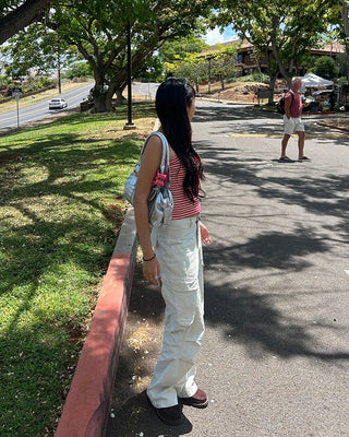 Ivory pleated cargo flare pants