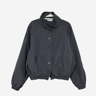 High-neck windbreaker with buttons