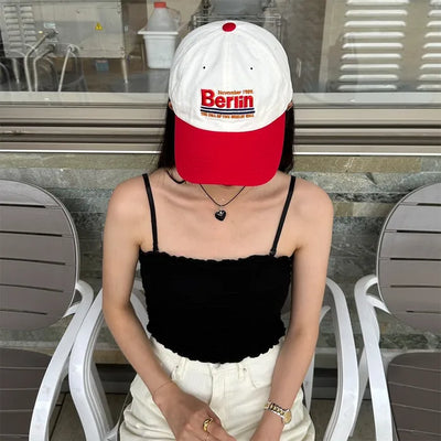 Berlin logo color scheme cap