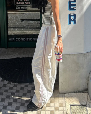 Wide-leg nylon jersey pants with hip pockets